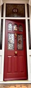 Stained glass in London wooden front doors
