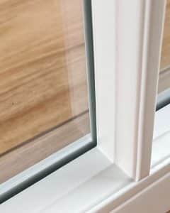 Close up of vacuum glazing in glazing bar
