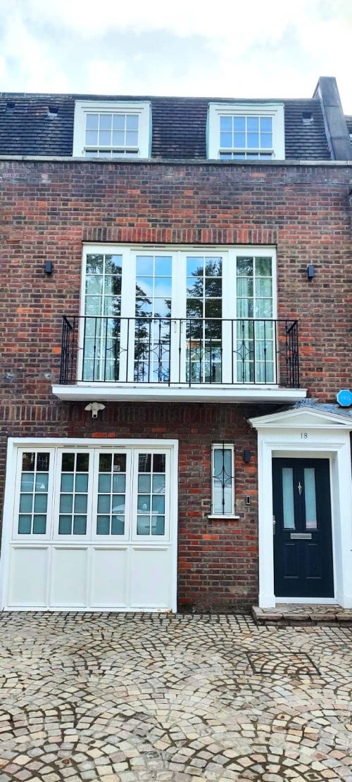 Timber French doors opening to the balcony