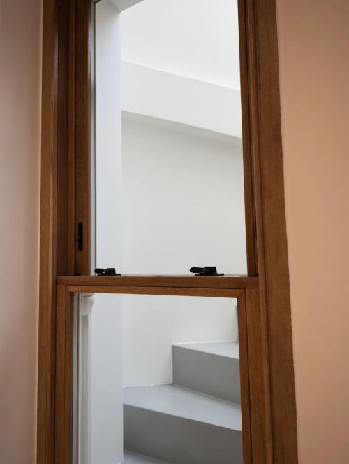 Oak sash window stained in clear lacquer